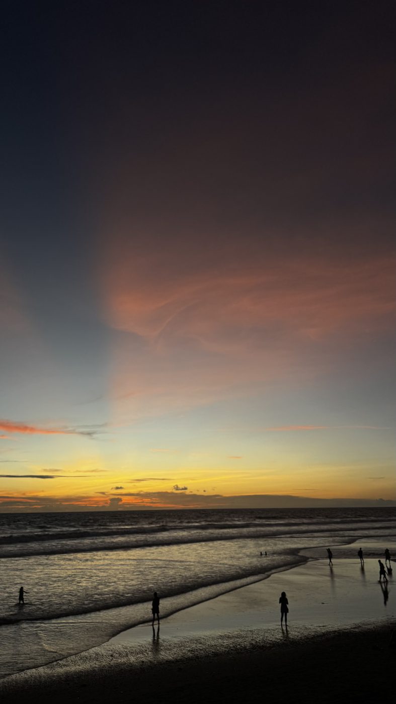Sunset over a beach in Bali, Indonesia